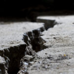 cracked road concrete close up earthquake damage