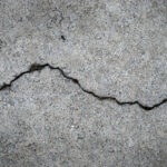 A crack runs across a cement floor